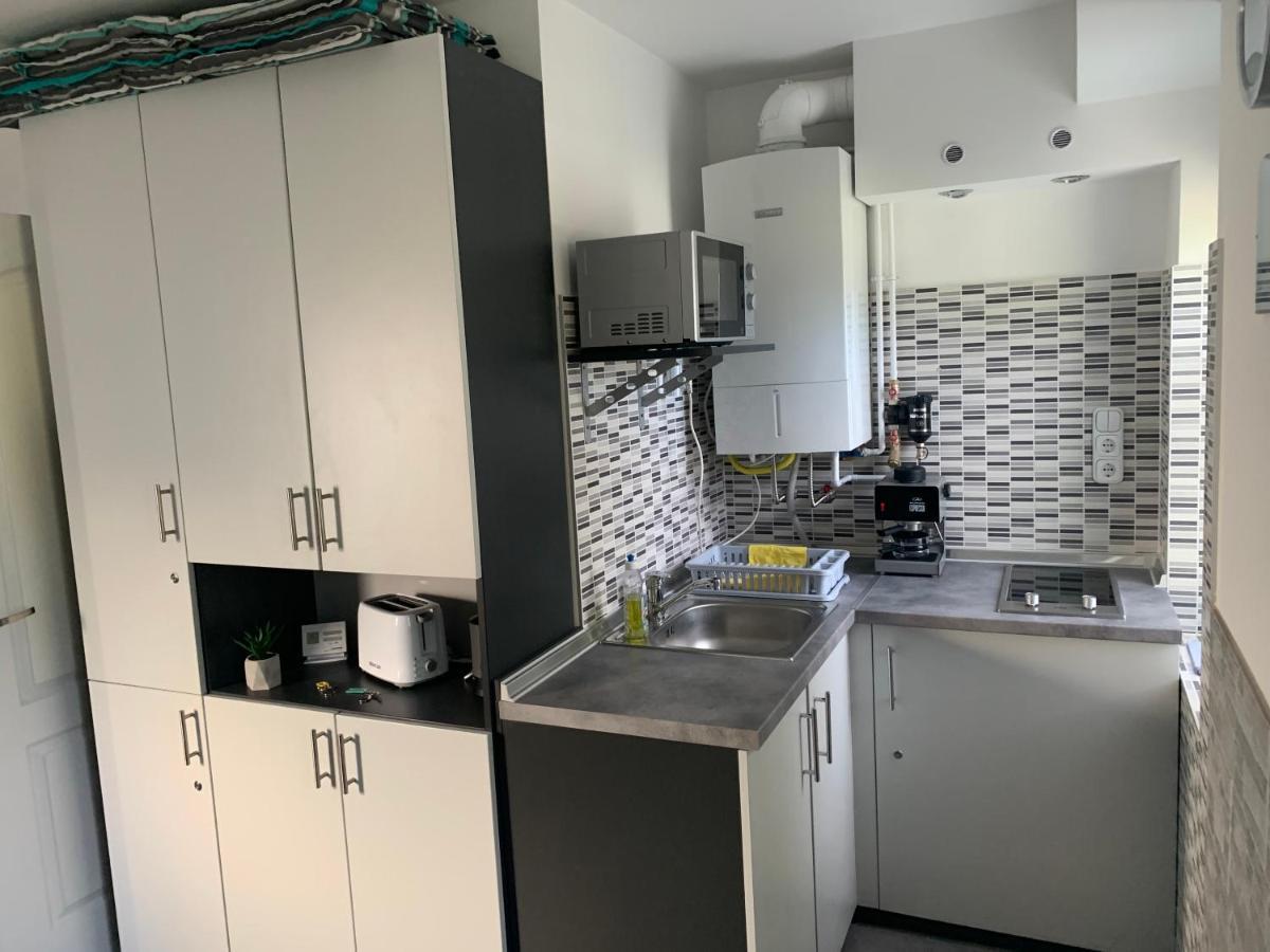 Komo Apartment Buk Bagian luar foto