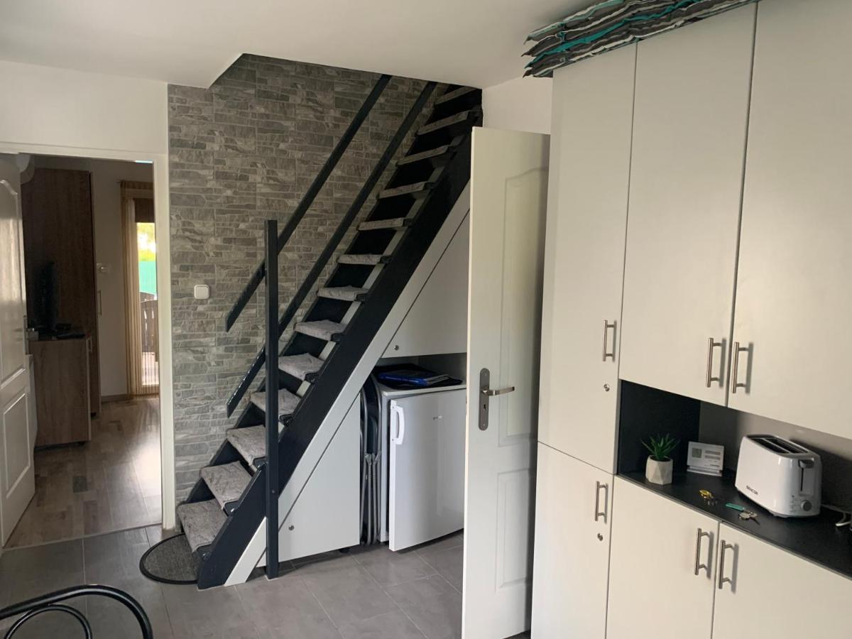 Komo Apartment Buk Bagian luar foto