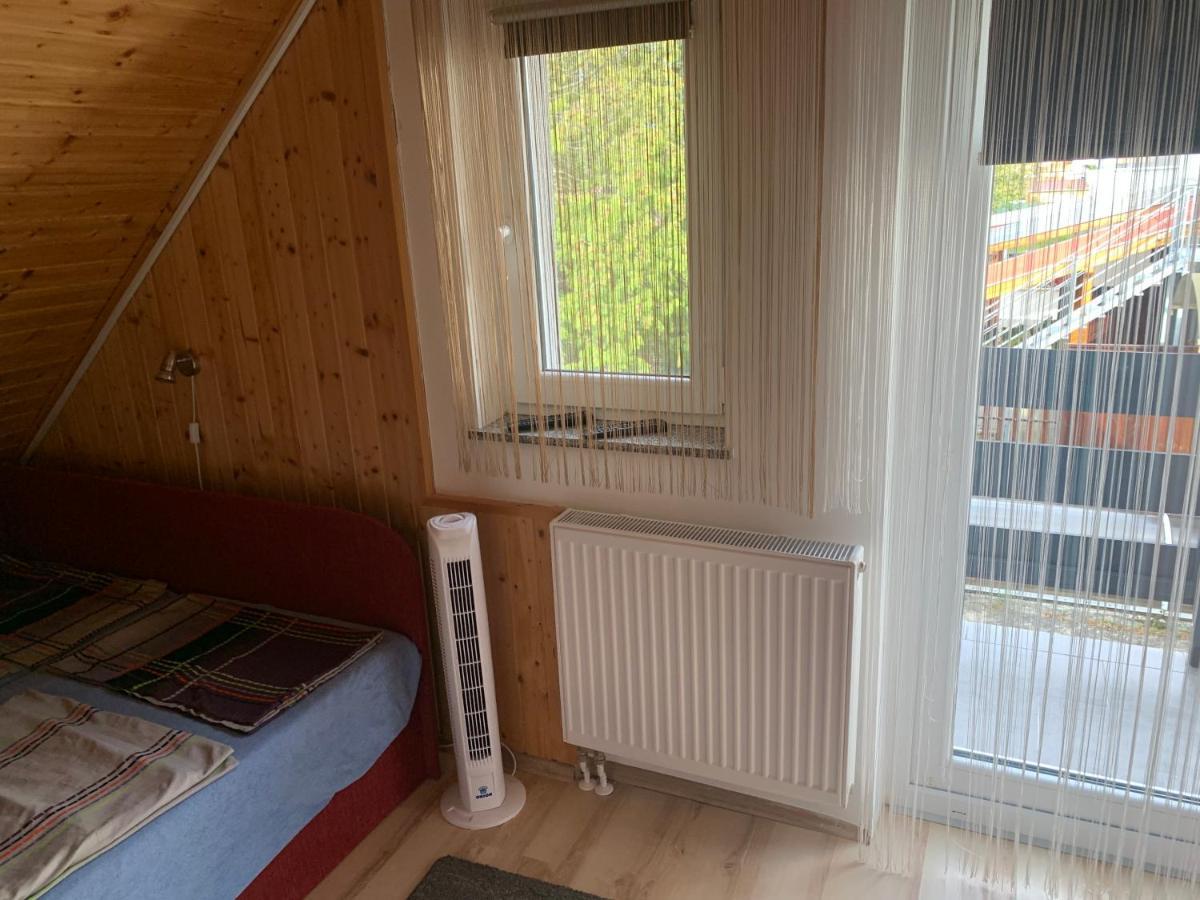 Komo Apartment Buk Bagian luar foto