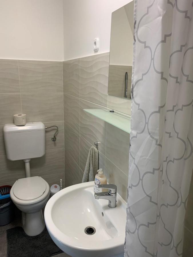 Komo Apartment Buk Bagian luar foto