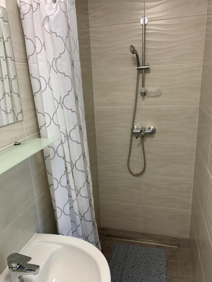 Komo Apartment Buk Bagian luar foto