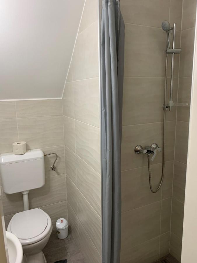 Komo Apartment Buk Bagian luar foto