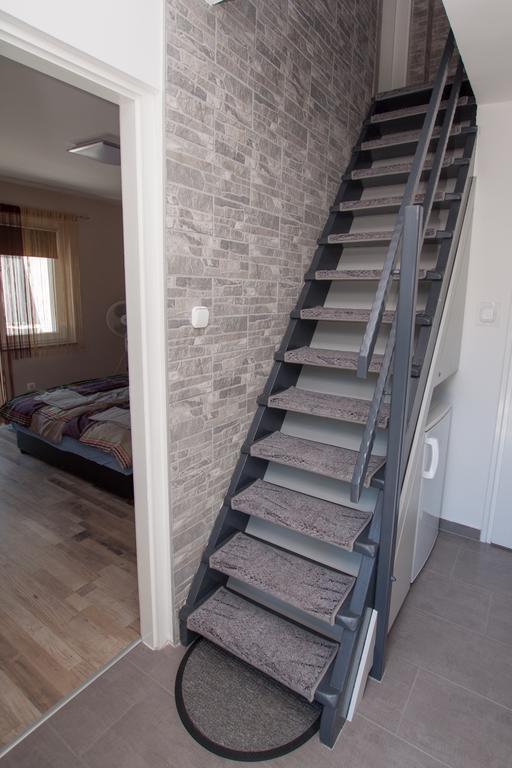 Komo Apartment Buk Bagian luar foto